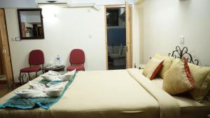 Setusvæði á Cosy Hotel