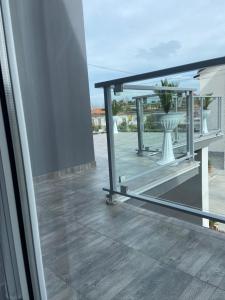 a balcony with a table and a vase on it at B&B FRONTEMARE San Salvo Marina CH in San Salvo