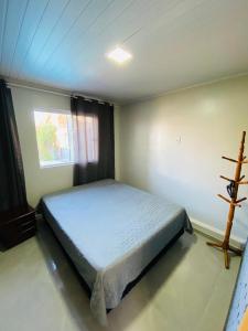 En eller flere senge i et værelse på Casa Família Morada da plataforma