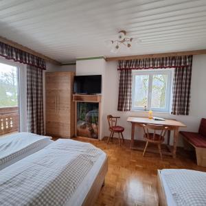 Postel nebo postele na pokoji v ubytování Lassingbauer