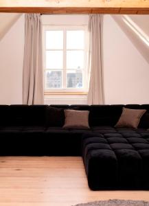 Ein Sitzbereich in der Unterkunft YokoLou - Design-Apartments