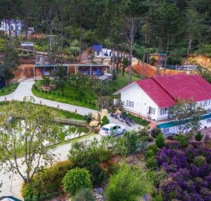 an aerial view of a house with a red roof at Scent Room - Village in Da Lat