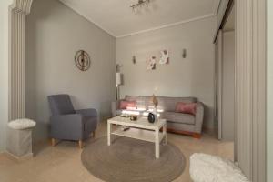 Posezení v ubytování Elvira's houses