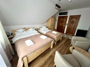 Postel nebo postele na pokoji v ubytování Rozeta
