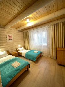 Ένα ή περισσότερα κρεβάτια σε δωμάτιο στο Horizon Apartmens +47 φωτογραφίες