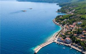 an aerial view of a resort on a lake at Beautiful Home In Blato With Wifi in Blato +28 photos