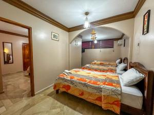 Letto o letti in una camera di Hotel Bucaneiro