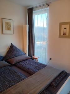 En eller flere senge i et værelse på Domizil Koblenz