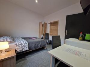 En eller flere senge i et værelse på Pokój Superior 1 - Willa Lawenda