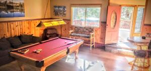 a living room with a pool table in it at Hot Tub Pool Table Mountain Views Large Redwood Decks near Best Beaches Heavenly Ski Area and Casinos 9 in Stateline