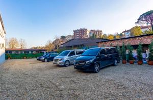 a row of parked cars parked in a parking lot at Mia Mia Suites in Istanbul