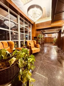 Χώρος καθιστικού στο Walisons Hotel