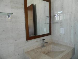 Baðherbergi á ACL Suites