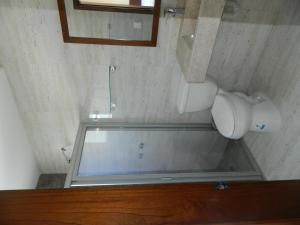 Baðherbergi á ACL Suites