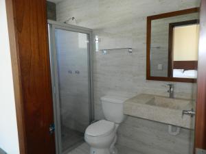 Baðherbergi á ACL Suites