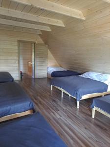Un pat sau paturi într-o cameră la Bordo Villa