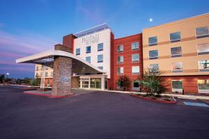 an empty parking lot in front of a hospital at Fairfield Inn & Suites by Marriott Phoenix West/Tolleson in Phoenix