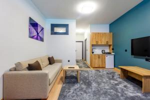 a living room with a couch and a table at Mia Mia Suites in Istanbul