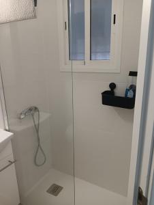 a shower with a glass door in a bathroom at 2 bedroom Apartment in San Fernando in San Fernando