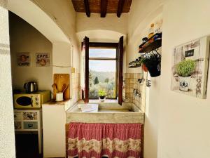 Fotografia z galérie ubytovania Casina del Fabbro v destinácii Montescudaio + 28 fotografií