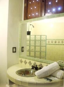 Een badkamer bij Hotel Casa de los Santos