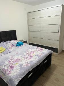 Postel nebo postele na pokoji v ubytování Apartmani Povlen 52