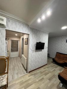 TV a/nebo společenská místnost v ubytování Guest House Imereti