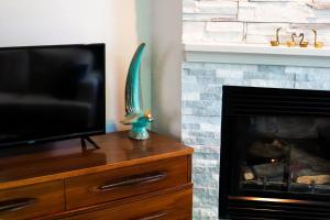TV a/nebo společenská místnost v ubytování Starry Night Inn