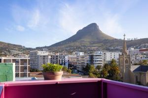 a view of a mountain from a balcony at Penthouse Studio stunning Table Mountain view in Cape Town