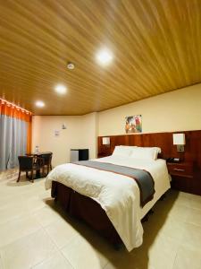 Postelja oz. postelje v sobi nastanitve Hotel Guacamaya