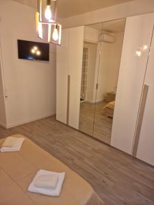 Postel nebo postele na pokoji v ubytování Marcella va a Civita