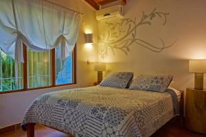 Postel nebo postele na pokoji v ubytování Living Hotel + 18 fotografií