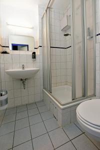 Koupelna v ubytování Ambiente by Next Inn