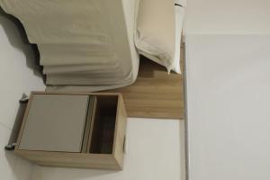 Apartamento Luxuoso à 2km da Litorânea客房内的一张或多张床位