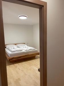 Łóżko lub łóżka w pokoju w obiekcie Appartement Berger