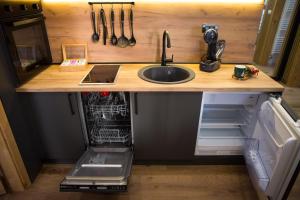 Η κουζίνα ή μικρή κουζίνα στο GreenMont Jahorina +36 φωτογραφίες