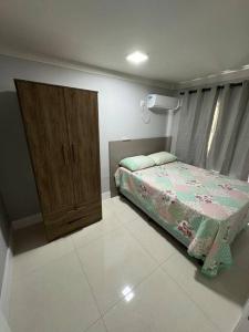 Katil atau katil-katil dalam bilik di Aparto Canto da Praia /40m d Mar
