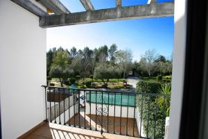 a balcony with a view of a park at Casa Rural Rafael Alberti - RNG Alojamientos in El Bosque