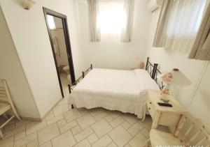 En eller flere senger på et rom på Bed & Breakfast dei Colli