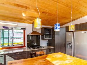 Kuchyň nebo kuchyňský kout v ubytování Te Tui Lodge + 22 fotografií