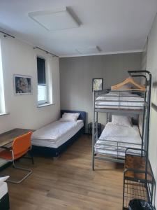 Postel nebo postele na pokoji v ubytování Rooms4Rest Bokserska - Private rooms for tourists - ATR Consulting Sp, z o,o,