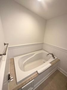 a bathroom with a bath tub in a room at Chub Cay Resort & Marina in Chub Cay