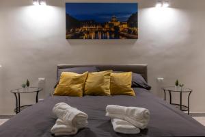 Кровать или кровати в номере A due passi dal Colosseo