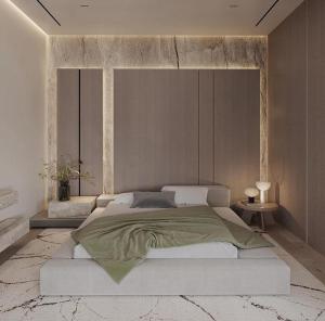 a bedroom with a large bed in a room at FIRSTHOUSE VILLA@BATU FERRINGHI in Batu Ferringhi