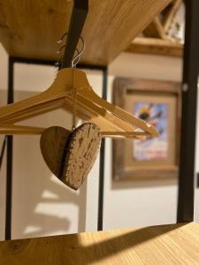 a wooden star is hanging from a ceiling at La Chambre de Chaloz in Valtournenche