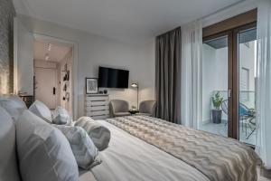 Postel nebo postele na pokoji v ubytování Melody Apartment
