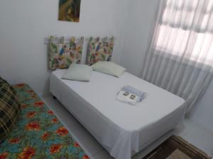 Postel nebo postele na pokoji v ubytování Hotel Pousada Girassol