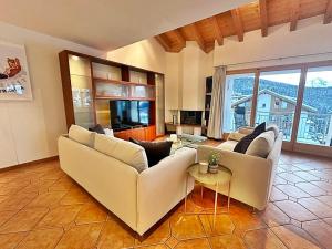Posezení v ubytování Attika - 85m2, Holz, Ausblick, mit Garage - ME17-A