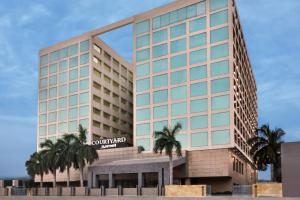 an artist rendering of the guilford hotel at Courtyard by Marriott Chennai in Chennai