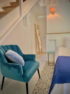 Letto o letti in una camera di PUNTA POPY Boutique HOTEL